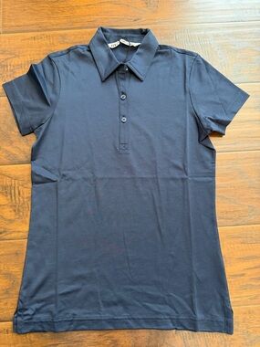 Travis Mathew Women's Navy Blue Polo Top